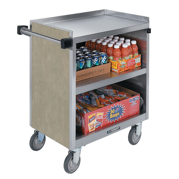 A Lakeside metal utility cart with drinks and snacks on it.