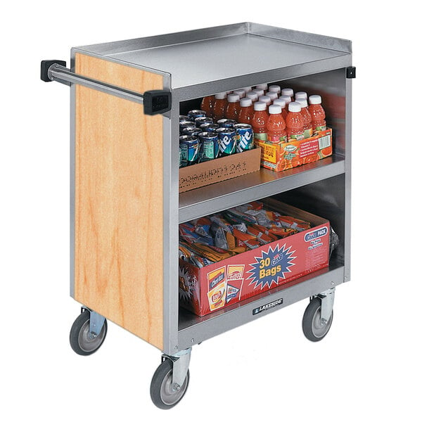A Lakeside stainless steel utility cart with drinks and snacks on it.