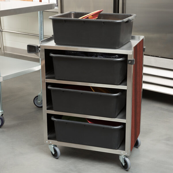 A Lakeside stainless steel utility cart with black containers on top.