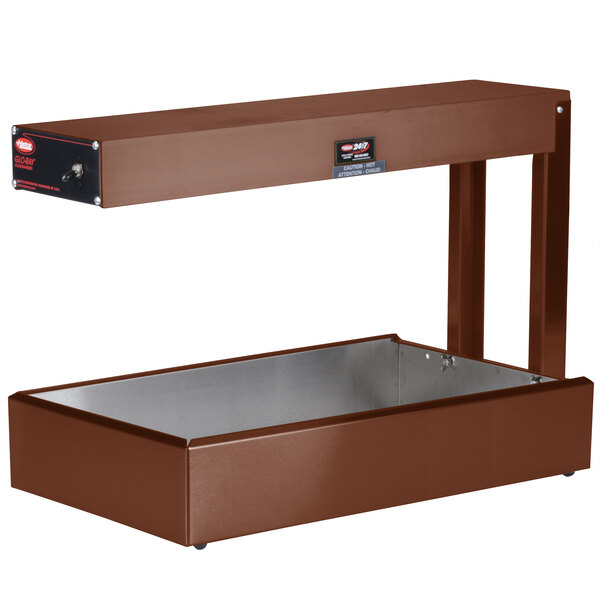 A brown rectangular metal box with a metal shelf inside.