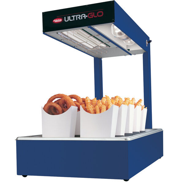 A blue Hatco Ultra-Glo food cart with fries and hot dogs in white containers.