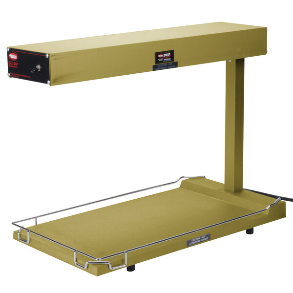 A yellow Hatco table top food warmer with a heated shelf.