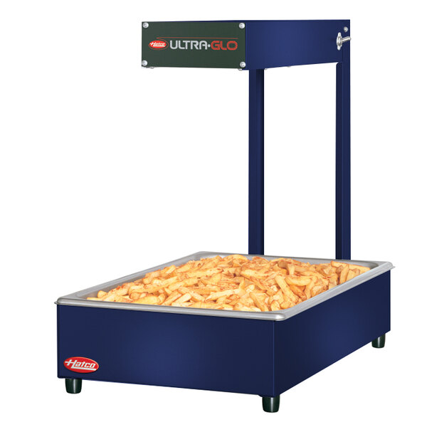 A Hatco Ultra-Glo portable food warmer with french fries inside.