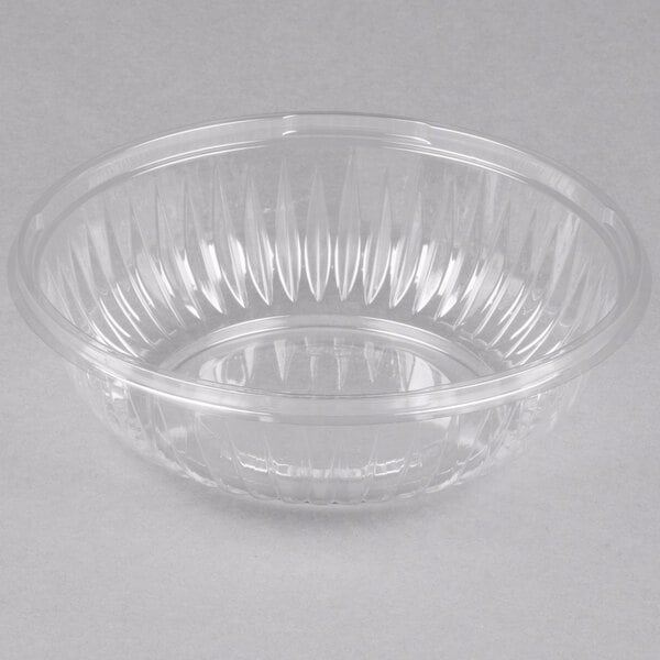 A Dart clear plastic bowl on a white background.