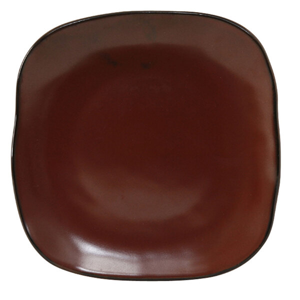 A brown square Tuxton Artisan china plate with black edges.