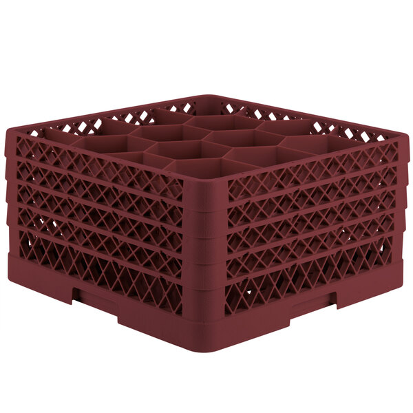 A red plastic Vollrath Traex glass rack with 12 compartments and holes.