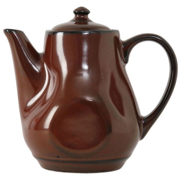 A brown Tuxton china teapot with a handle and lid.