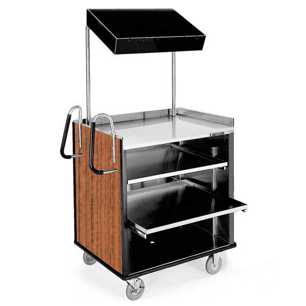 A stainless steel Lakeside vending cart with a black and silver Victorian cherry laminate shelf.
