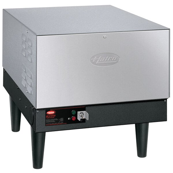A silver square box with black legs, the Hatco C-54 booster heater.