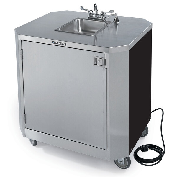 A stainless steel Lakeside portable hand sink on wheels with a black cabinet.