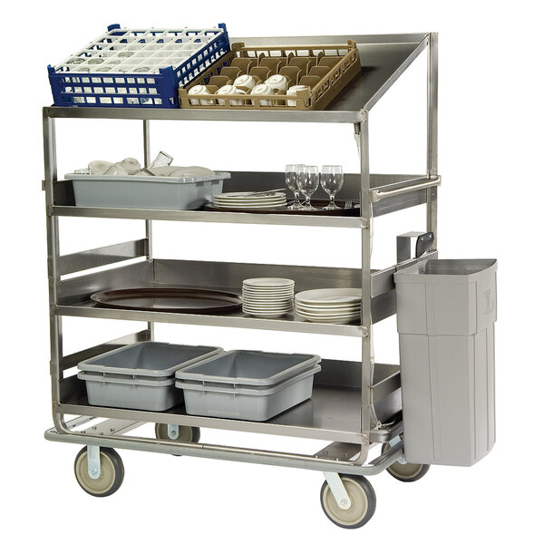 A Lakeside stainless steel dish cart with trays and plates on shelves.