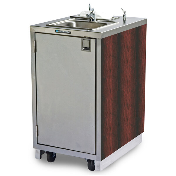 A stainless steel sink and a red maple wood cabinet on a metal cart.