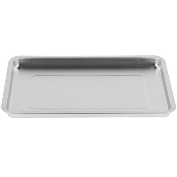 A stainless steel rectangular baking pan with a silver border.