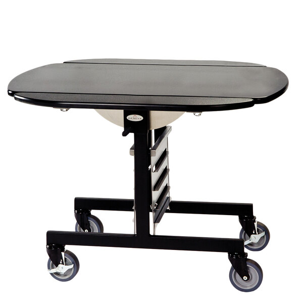 A Geneva black round top room service table with wheels.