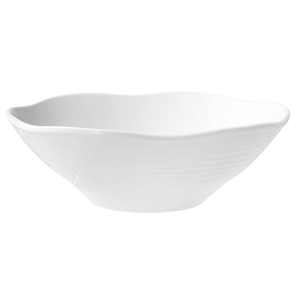 A white Thunder Group melamine bowl with a curved edge.