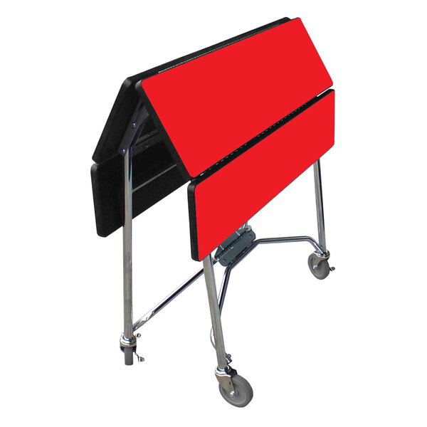 A Lakeside red folding table with wheels.