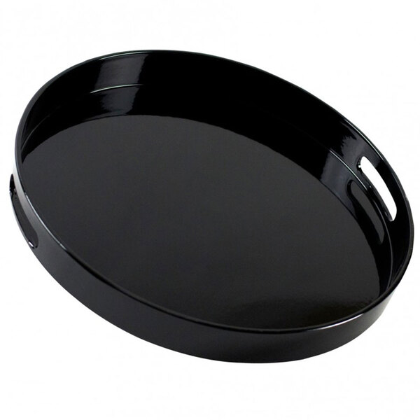 A black round tray with handles.
