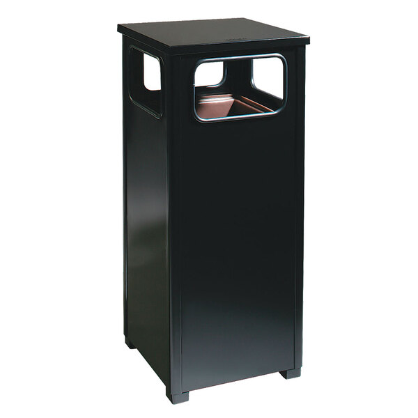 A black rectangular Rubbermaid waste receptacle with a flat top and a hole for trash.