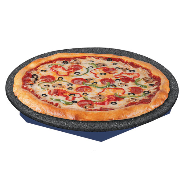 A pizza with pepperoni and olives on a heated stone shelf with a blue and black base.
