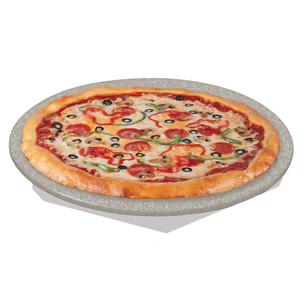A pizza on a Hatco heated stone shelf.