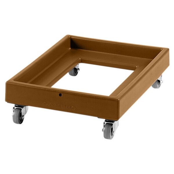 A brown Cambro milk crate dolly with wheels.