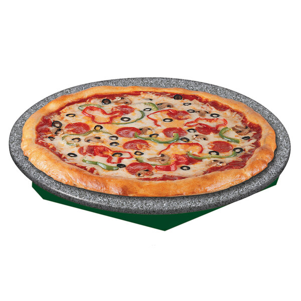 A pizza on a Hatco green and gray granite heated stone shelf.