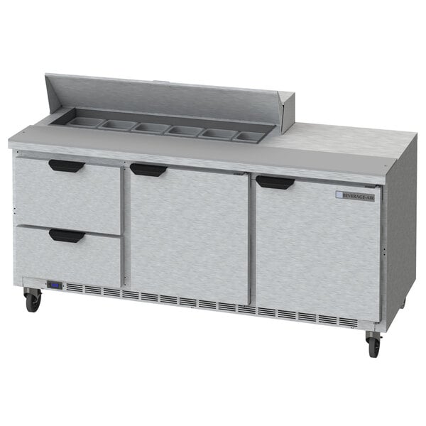 A Beverage-Air refrigerated sandwich prep table with 2 drawers on a stainless steel counter.