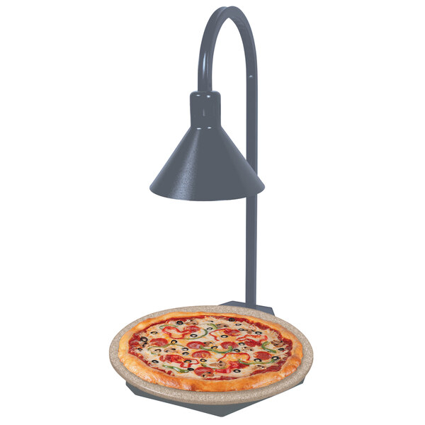 A Hatco heated stone shelf with a lamp above a pizza on a table.