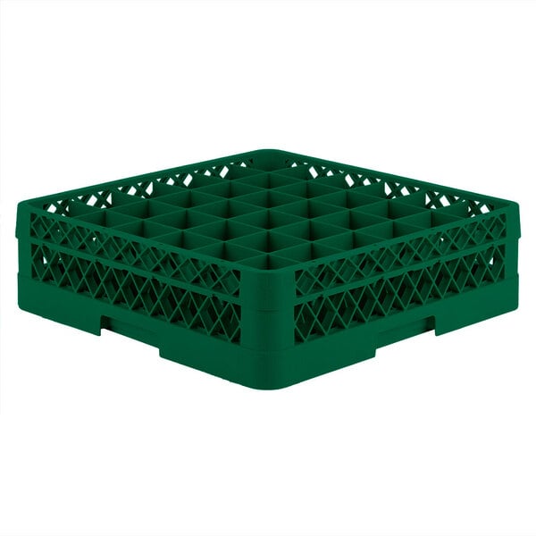 A green plastic Vollrath Traex glass rack with many compartments and holes.