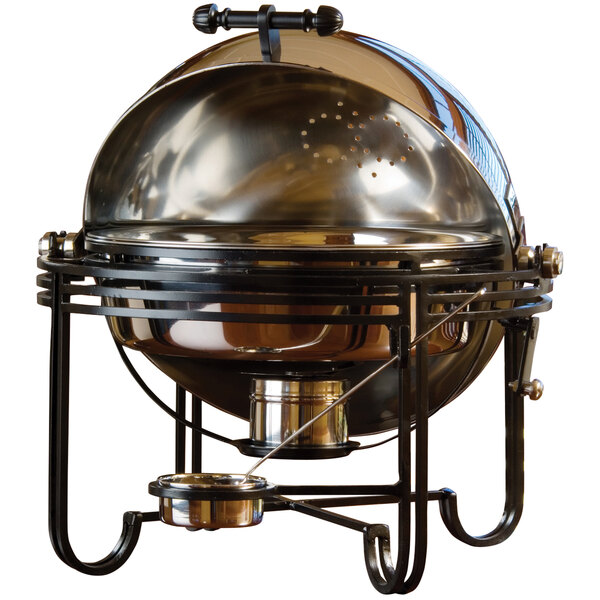 An American Metalcraft round stainless steel chafer with a roll top lid on a table.