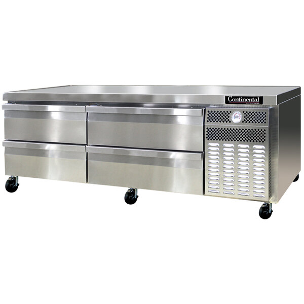 A stainless steel Continental Refrigerator chef base with four drawers.