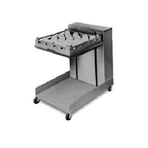 A APW Wyott cantilever rack dispenser for trays on wheels with a tray on it.