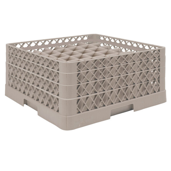 A beige plastic Vollrath glass rack with many compartments and holes.