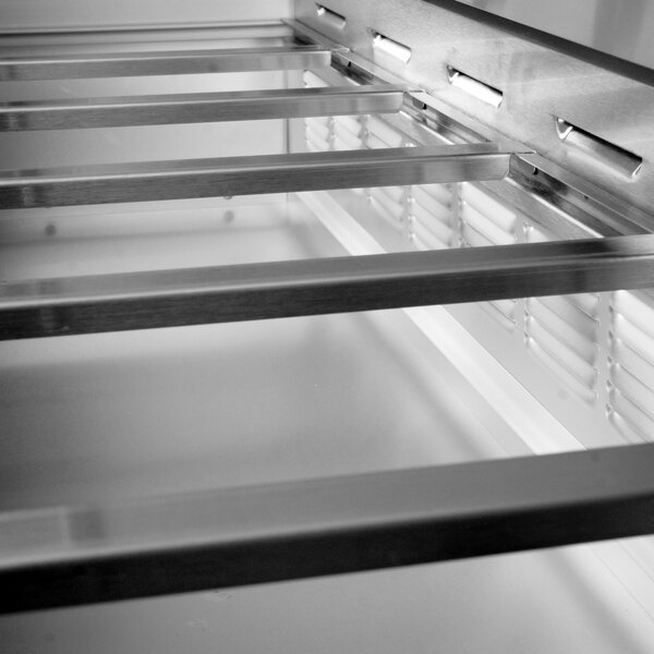 A Beverage-Air stainless steel divider bar for refrigeration pans.