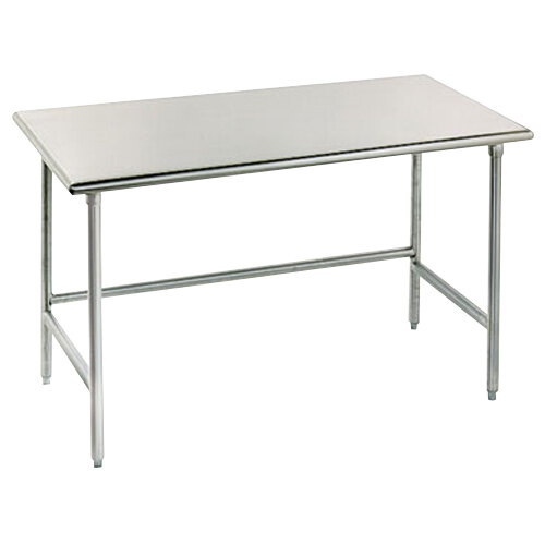 A stainless steel Advance Tabco work table with metal legs.