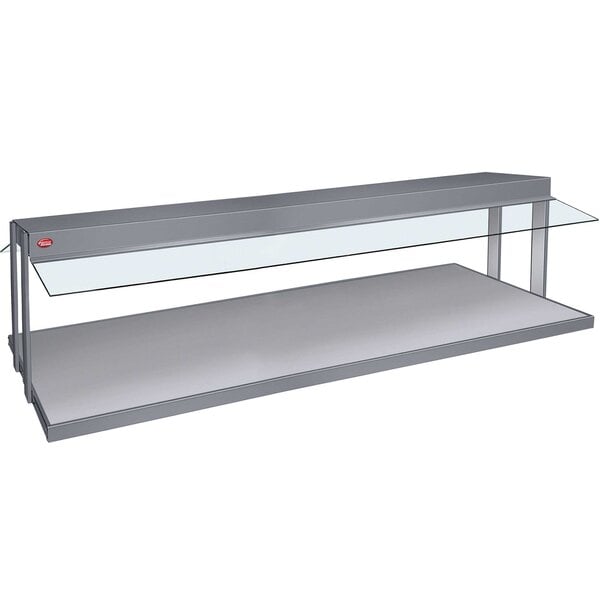 A grey Hatco countertop buffet warmer with a stainless steel shelf and toggle controls.