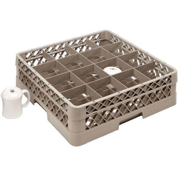 A Vollrath beige plastic cup rack with 16 compartments holding a white cup.