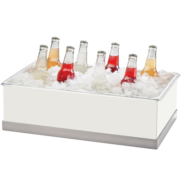 A white Cal-Mil ice and beverage housing display with bottles inside.