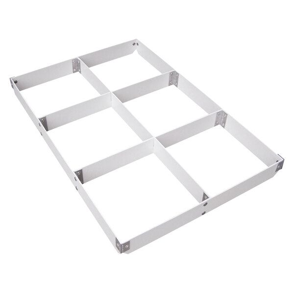 A white rectangular fiberglass sheet pan extender with metal corners and holes.
