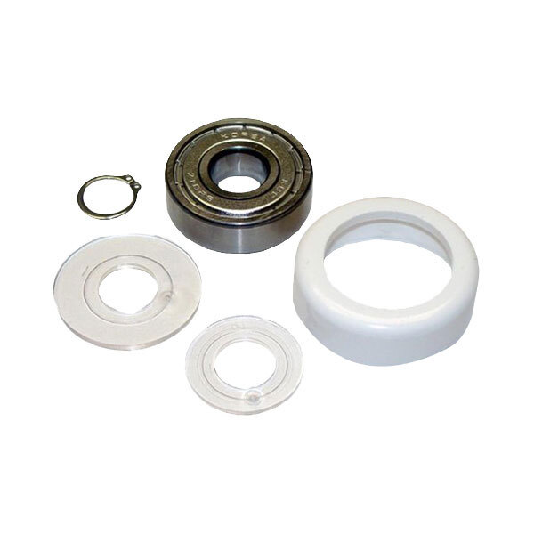 A metal bearing kit with a metal ring and a hole in the middle.