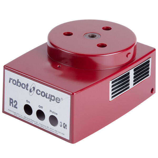 A red circular Robot Coupe motor support with holes.