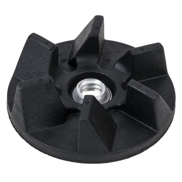 A black plastic clutch for Hamilton Beach bar blenders with a hole in the center.