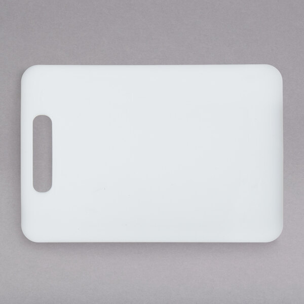 A white rectangular HS Inc. Polyethylene cutting board.