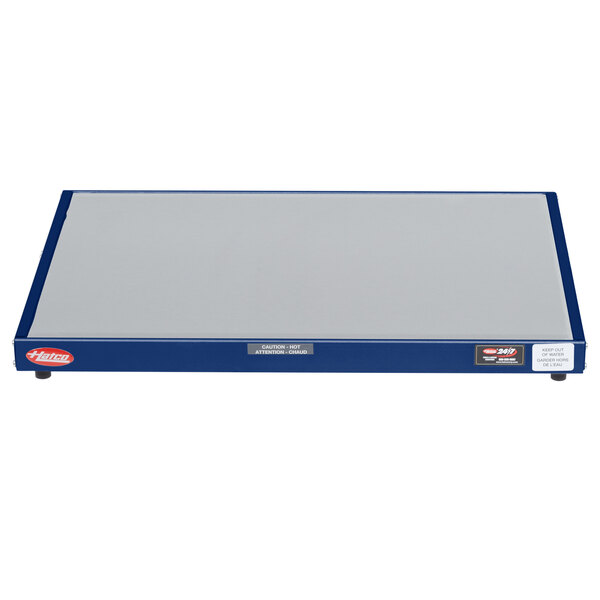 A white and blue rectangular Hatco heated shelf warmer.