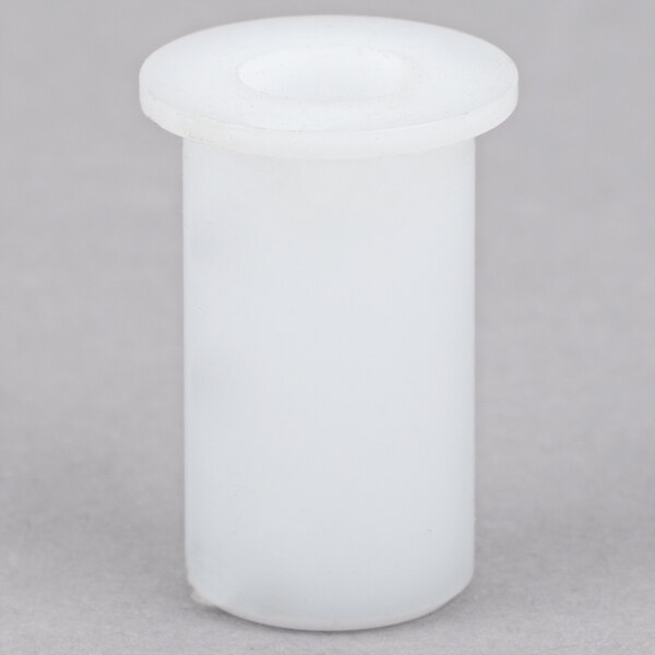 A white plastic cylinder with a round top and a white lid.