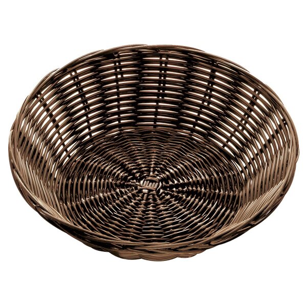 A brown round rattan basket with a handle on a white background.