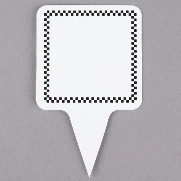 A white sign spear with black and white checkered border.