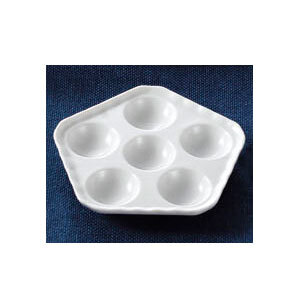A white hexagonal CAC porcelain dish with six holes.