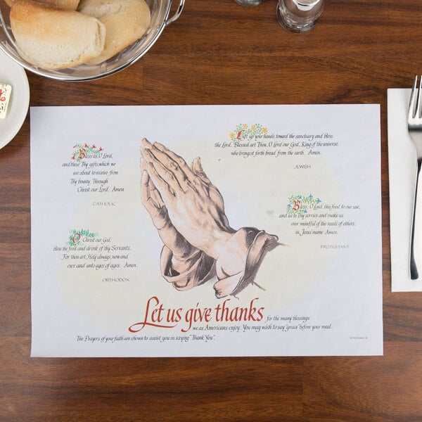 A Hoffmaster paper placemat with a prayer from four faiths.