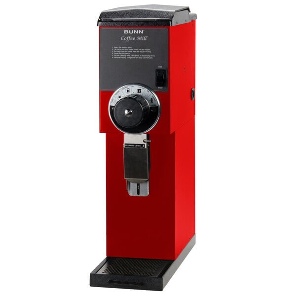A red and black Bunn G3 bulk coffee grinder.